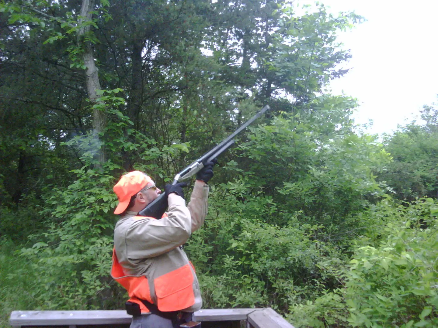 Instructor demonstrating shooting 12-gauge Sporting Clays Targets